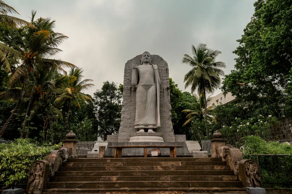 giant standing buddha statue at dambulla cave temple.