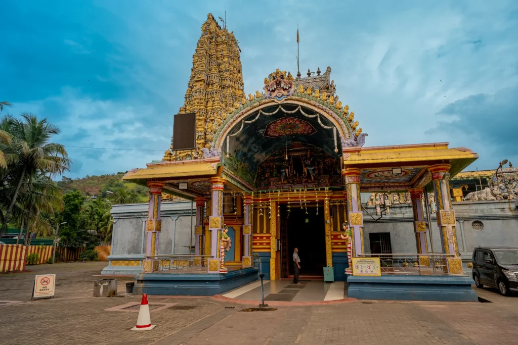 vibrant entrance and golden gopuram of a hindu temple in sri lanka.